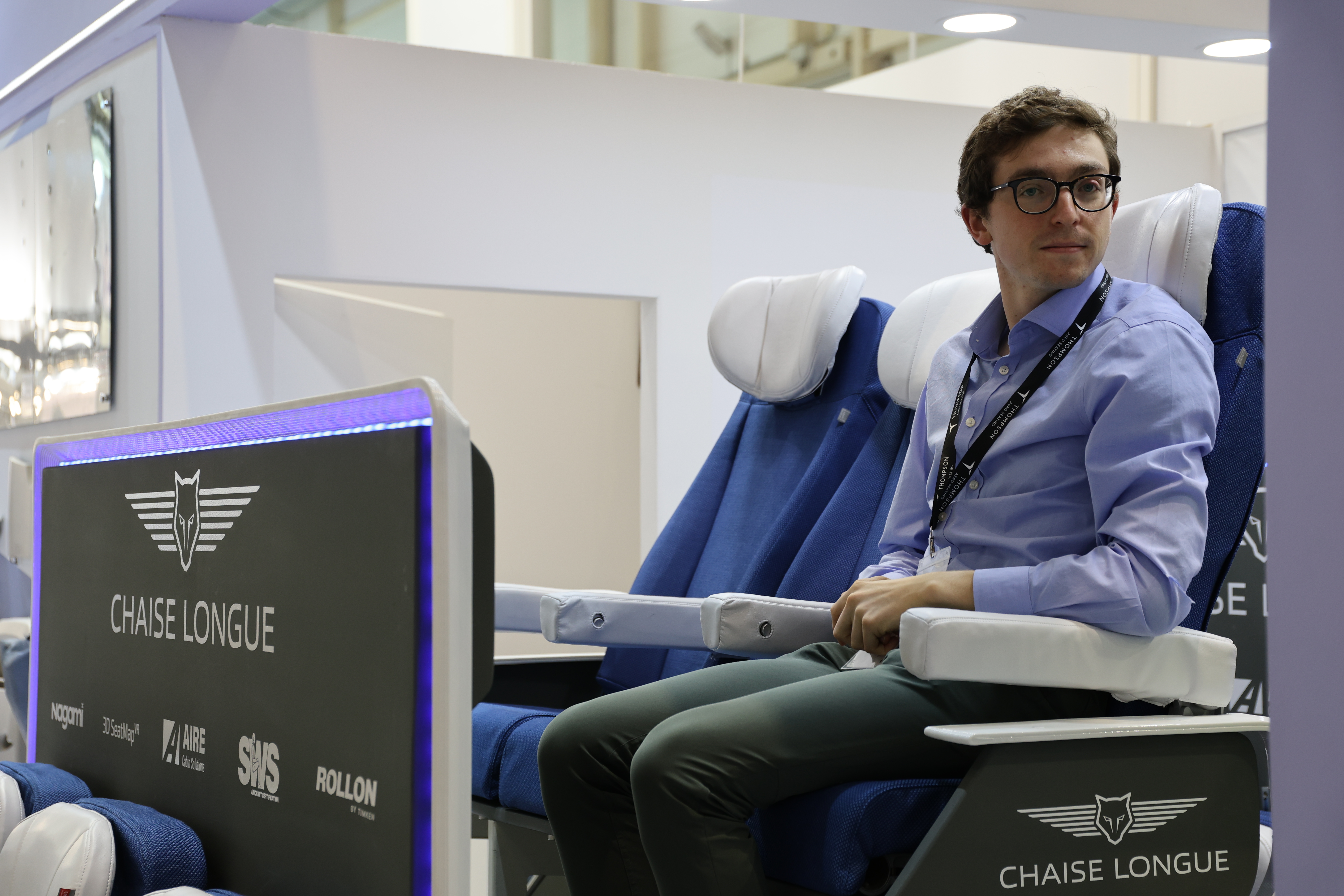 man sat on chaise lounge double-decker seating concept